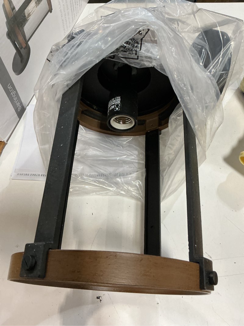 Condition photo showing As Is for kichler barrington 1-light 16-in h distressed black outdoor wall light