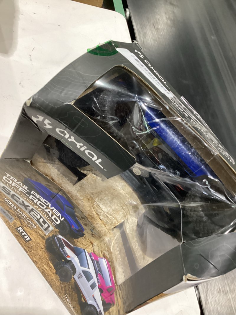 Condition photo showing Good Condition for axial rc truck 1/24 scx24 base camp 4x4 rock crawler brushed rtr (everything needed to run is included) - blue, axi-1219t2