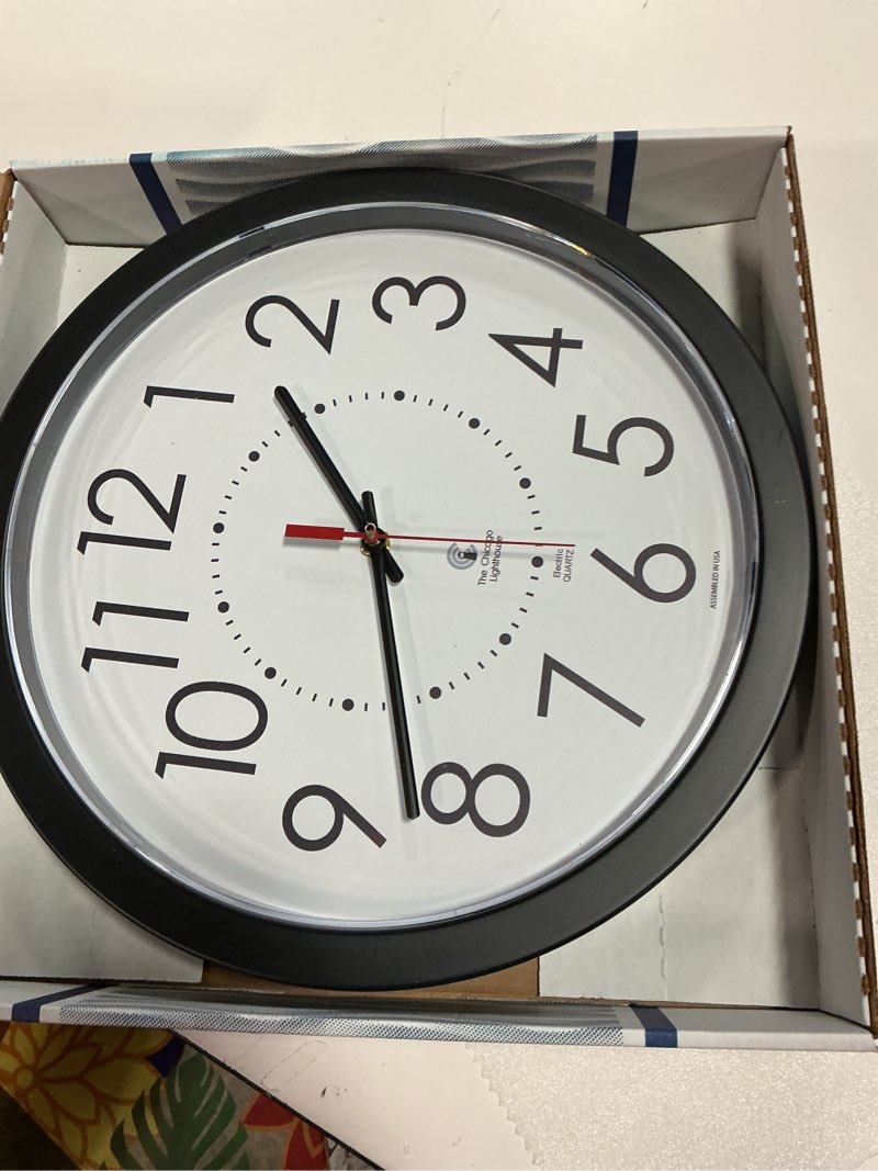 Condition photo showing As Is for 14.5  blk electric clock  12.5  dial  5  cord ul rated movement