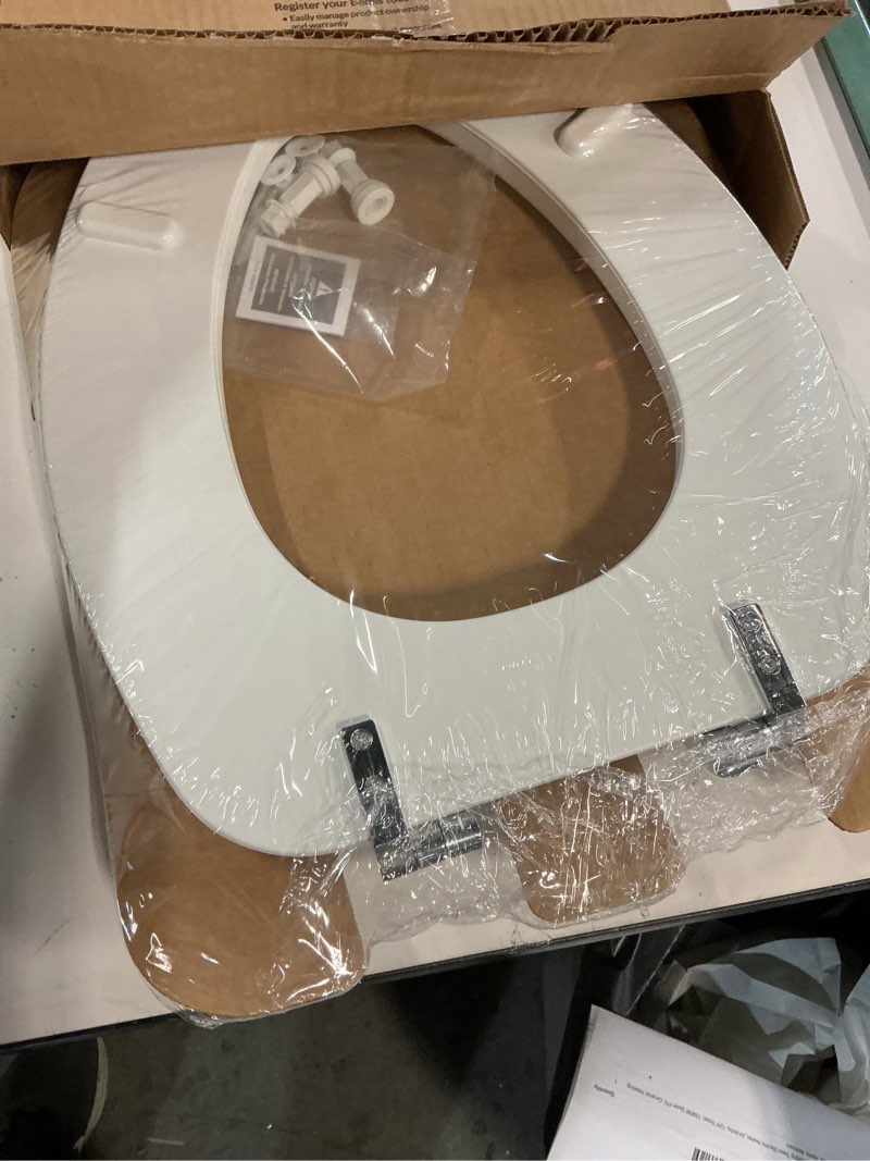 Condition photo showing New/Like New for Mayfair Padded Toilet Seat with Chrome Hinges, Soft Vinyl over Wood Core Seat, Made in USA, Elongated, White