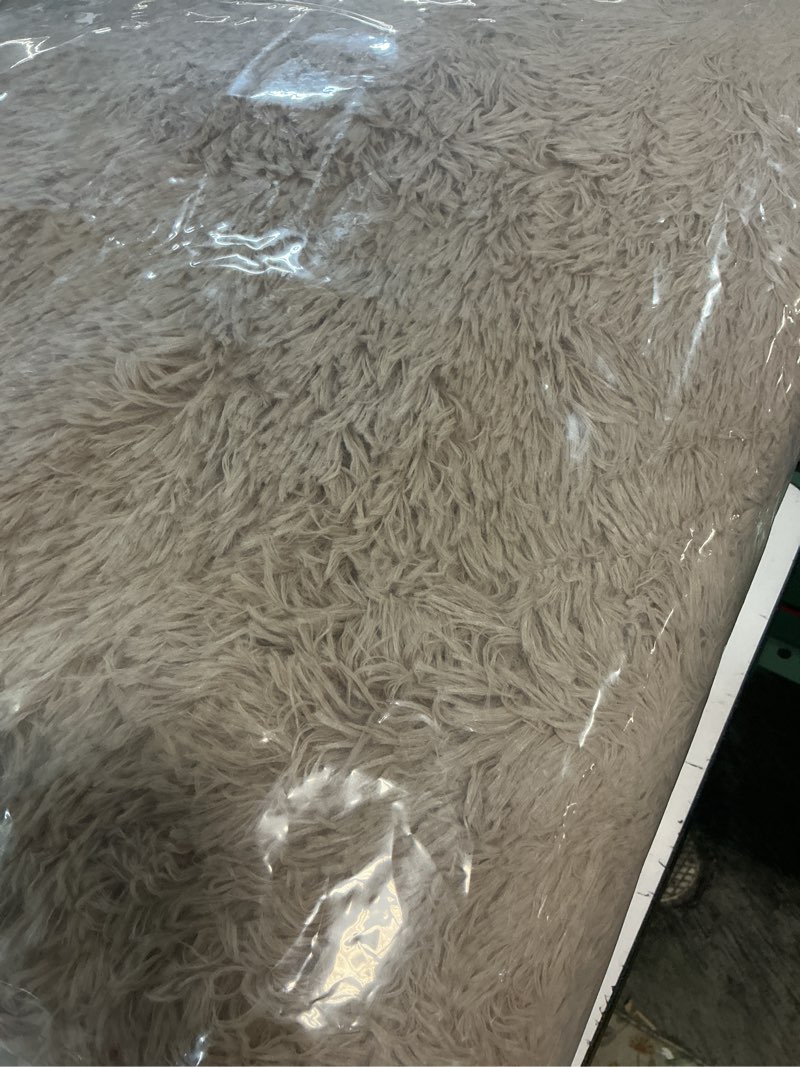 Condition photo showing Good Condition for olanly beige round rugs for bedroom - machine washable, 8 ft circle area rugs for living room, soft and fluffy shaggy carpet for teen girls and boys, nursery rooms, dorms, home decor aesthetic 8 ft round beige