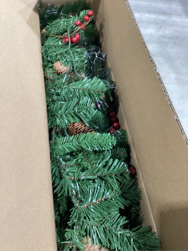 Condition photo showing Good Condition for national tree company 9 ft pre-lit crestwood spruce artificial christmas garland, christmas decoration with glitter, pinecones, red berries, 50 warm white led lights, 180 tips, timer, green battery operated tree