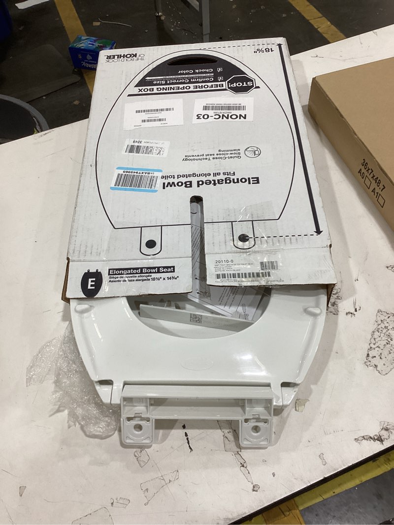Condition photo showing As Is for kohler k-20110-0 brevia elongated toilet seat with grip-tight bumpers, quiet-close seat, quick-attach hardware, white