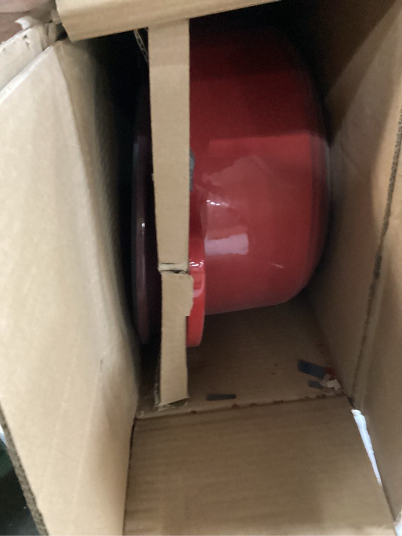 Condition photo showing Good Condition for Lodge 7 Quart Enameled Cast Iron Oval Dutch Oven with Lid – Dual Handles – Oven Safe up to 500° F or on Stovetop - Use to Marinate, Cook, Bake, Refrigerate and Serve – Red