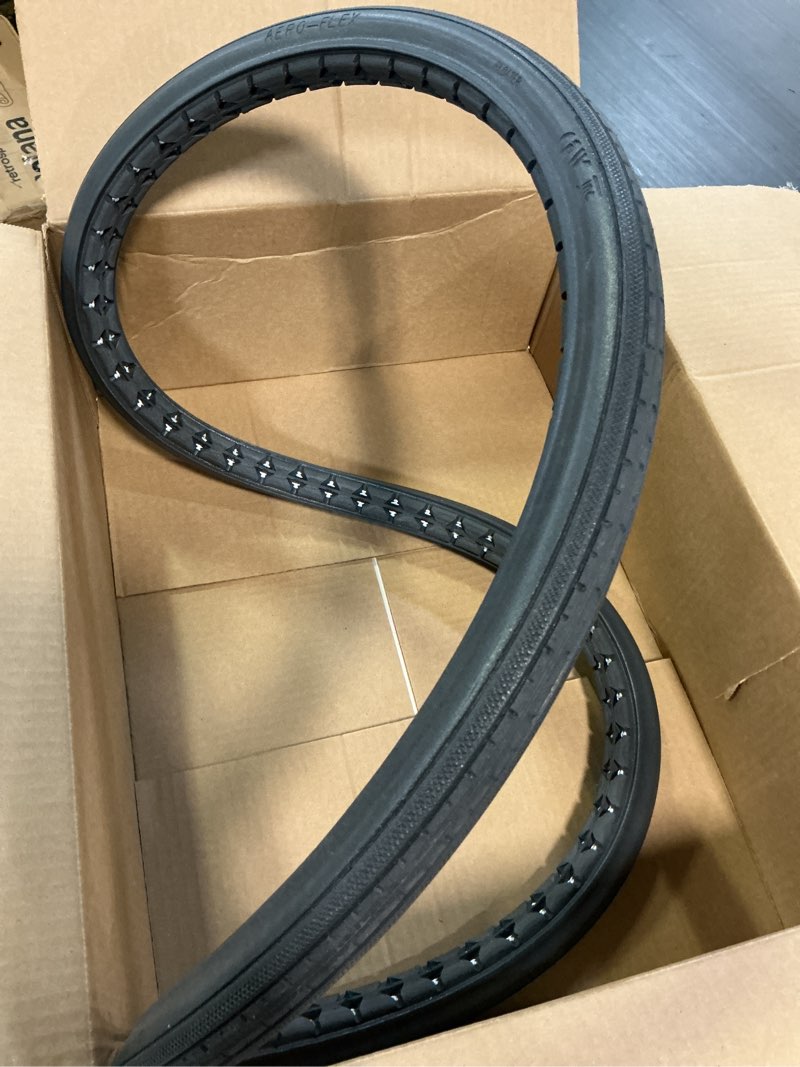 Condition photo showing Good Condition for the aftermarket group wheelchair tire, low profile urethane foam, pyramid shape, grey, 24" x 1", tag141001 urethane rear tire