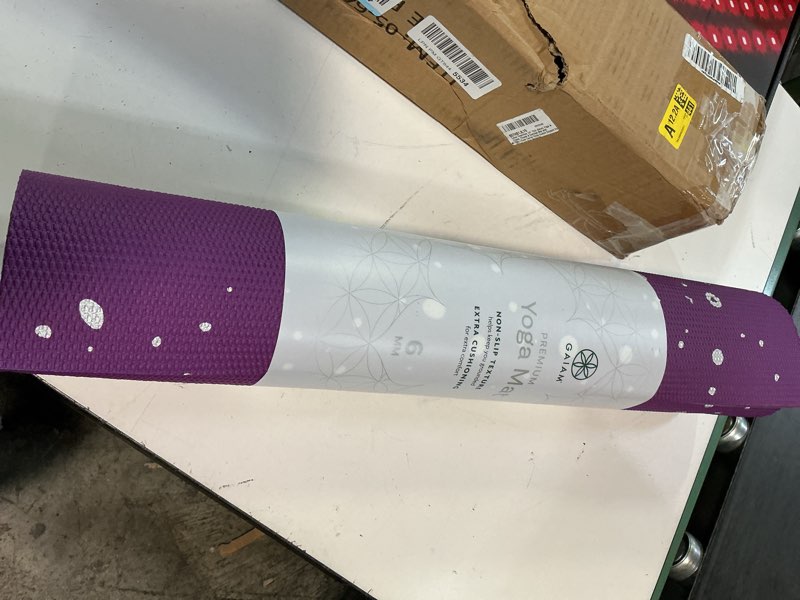 Condition photo showing New/Like New for gaiam essentials 1/4" thin (6mm) yoga & pilates, fitness & exercise mat with easy-cinch carrier strap cusion support for fitness and gym workouts purple 1/4" (6mm)