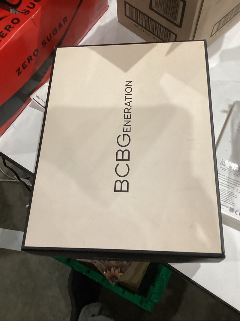 Condition photo showing New/Like New for BCBGeneration Women's Rino Heeled Sandal 9.5 Silver