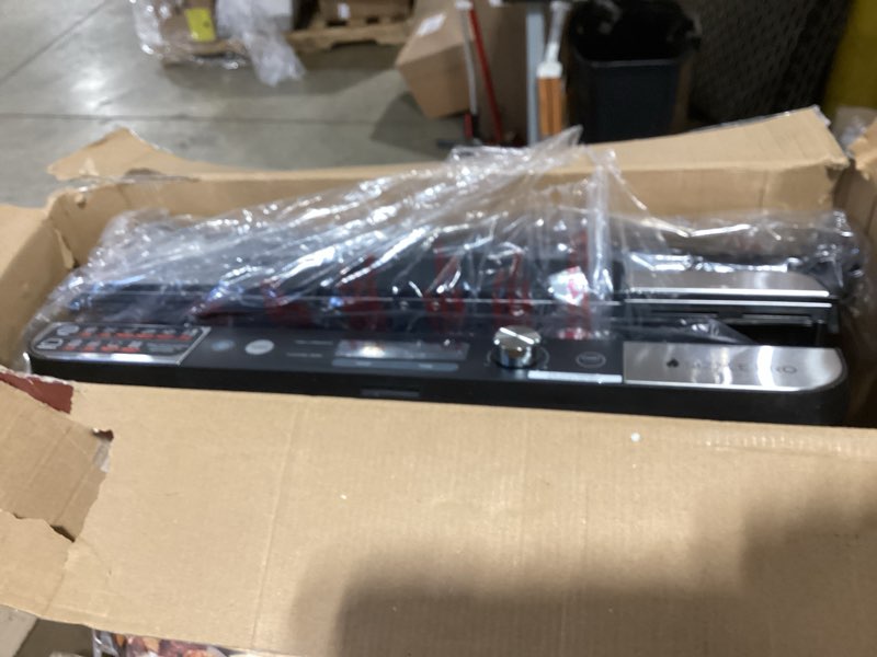 Condition photo showing New/Like New for ninja sizzle pro xl 20-inch indoor griddle + grill, detachable ventilated lid, grease control, ceramic nonstick plates, even edge cooking, extra large capacity, versatile, silver, gx101