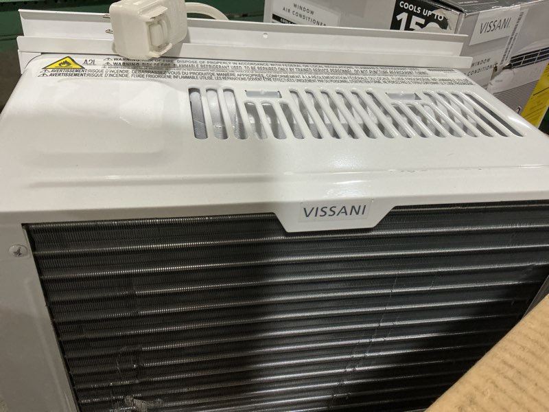 Condition photo showing As Is for 5,000 btu 115-volt window air conditioner 150 sq. ft. rooms with remote in white
