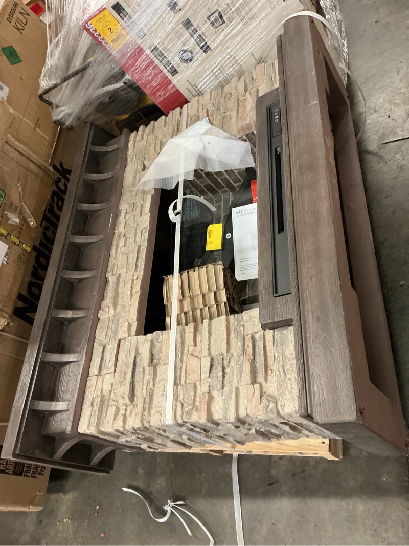 Condition photo showing As Is for allen + roth 53-in w sedona free standing infrared quartz fireplace 