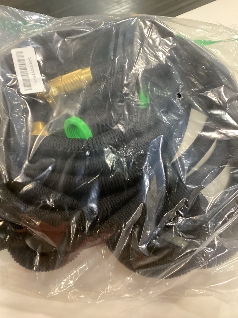 Condition photo showing Good Condition for flexi hose expandable garden hose with 8 function nozzle, 50ft - lightweight retractable garden hose, water hose - no-kink flexibility, 3/4 inch solid brass fittings and double latex core 50ft black
