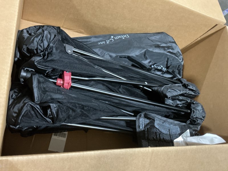 Condition photo showing Good Condition for dream on me nest portable playard in black with carrybag an shoulder strap, lightweight, packable and easy setup baby playard, breathable mesh sides and soft fabric - comes with a removable padded mat