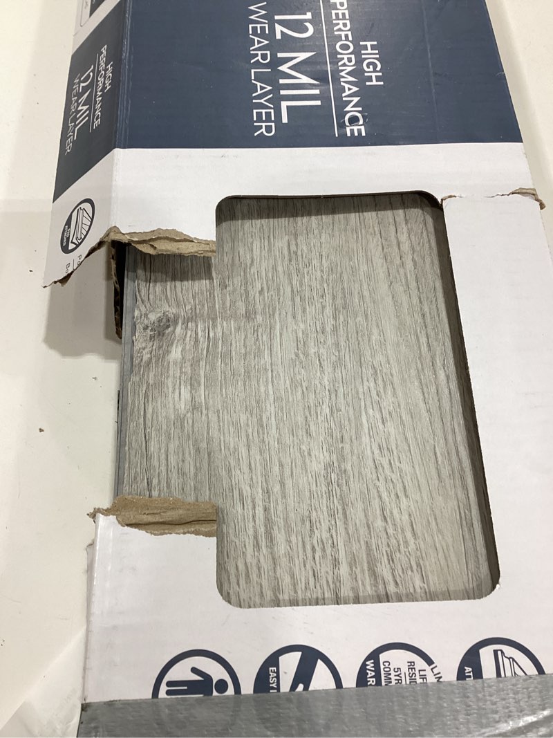 Condition photo showing As Is for procore plus charleston oak 7-in x 47.75-in waterproof interlocking luxury vinyl plank flooring (23.21-sq ft)