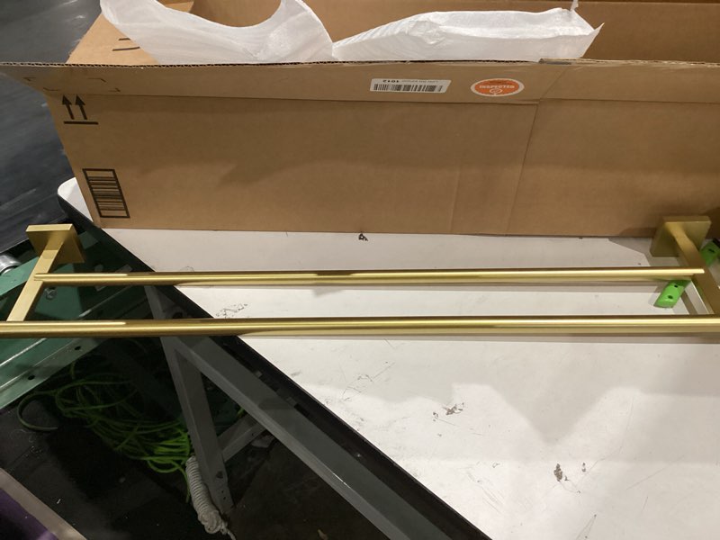 Condition photo showing As Is for double towel bar bronze 24in