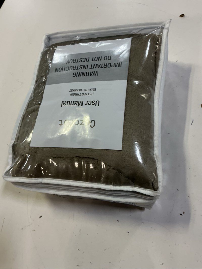 Condition photo showing Good Condition for heat blanket 50”x60” throw,soft flannel & sherpa reversible electric blanket with 10 heat settings,12 timer setting and 3 hours auto-shut off,etl certified machine washable,light brown