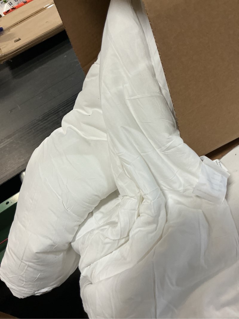 Condition photo showing As Is for silk bedding direct. luxury silk-filled mattress topper with fitted cotton sateen elasticated skirt. california king, 84" x 72". resting your dreams on pure mulberry silk.