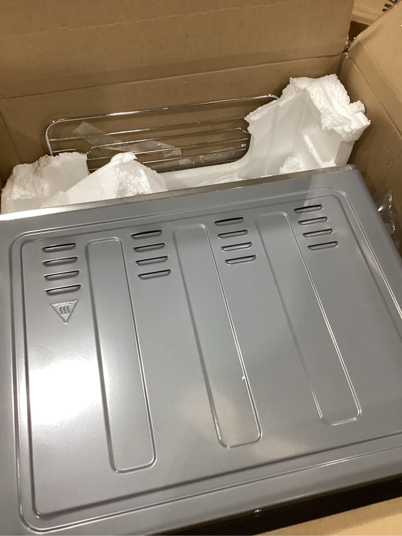 Condition photo showing As Is for kalorik maxx air fryer oven, 26 quart 10-in-1 countertop toaster oven & air fryer combo - fry, bake, roast, rotisserie, & more, large glass french doors & 9 accessories, 1700-watts, stainless steel