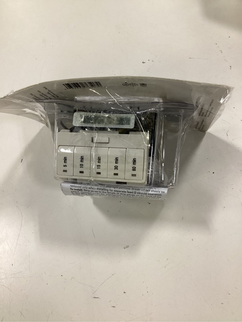 Condition photo showing As Is for eaton 15-amps 120-volt indoor programmable countdown digital lighting timer