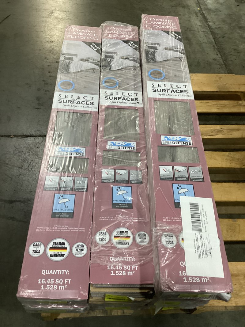 Condition photo showing New/Like New for 10 boxes x 16.45sqft per box =164.5 sqft select surfaces sclmf0481 pearl gray spilldefense laminate flooring