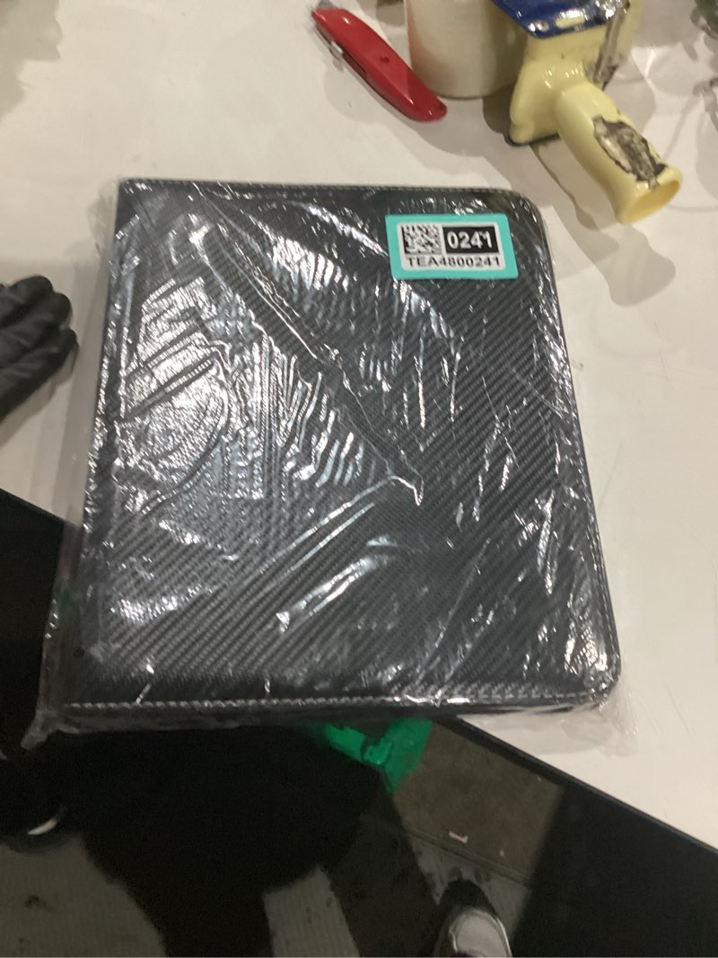 Condition photo showing As Is for 9 pocket card binder, premium zip trading card binder, 720 double sided pocket pu collection binder, collector album, card folder for mtg, tcg, sports cards, (black) 9 pocket 720 carbon black