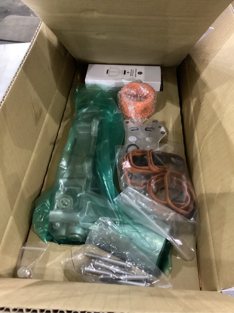 Condition photo showing As Is for Dorman 926-959 Patented Upgraded Aluminum Engine Oil Filter Housing with Oil Cooler and Filter Compatible with Select Models (OE FIX)