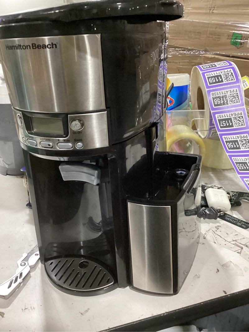 Condition photo showing As Is for hamilton beach (47950) coffee maker with 12 cup capacity & internal storage coffee pot, brewstation, black/stainless steel