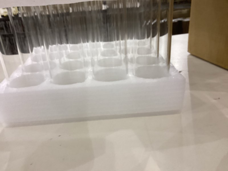 Condition photo showing New/Like New for SUREHOME Glass Cylinder Bud Vases for Centerpieces Set of 16 Bud Vase in Bulk 8 in Tall Clear Small Vases W:2.2" Tiny Modern Single Stem Mini Vases for Flowers Wedding Table Party Home Aesthetic Decor 2.2 x 8 Inch Pack of 16