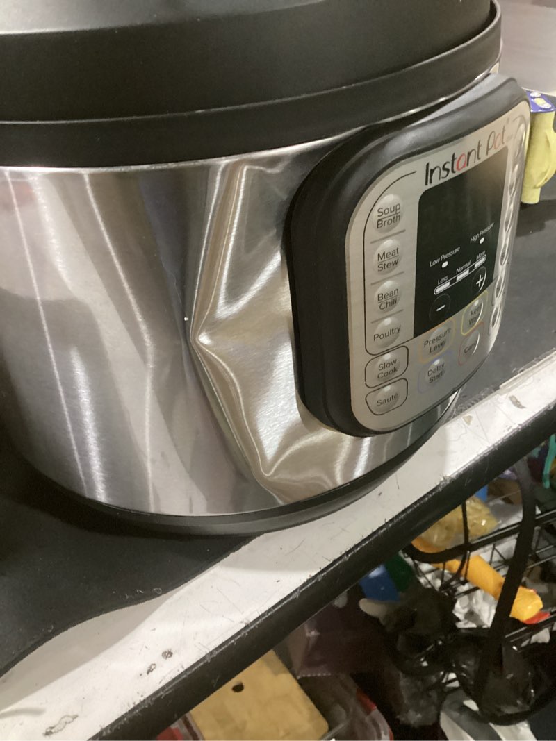 Condition photo showing As Is for instant pot duo 7-in-1 electric pressure cooker, slow cooker, rice cooker, steamer, sauté, yogurt maker, warmer & sterilizer, includes app with over 800 recipes, stainless steel, 8 quart