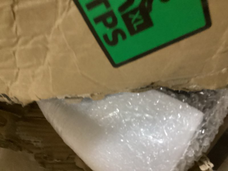 Condition photo showing As Is for Amazon Basics Cast Iron Kettlebell 60 Pounds