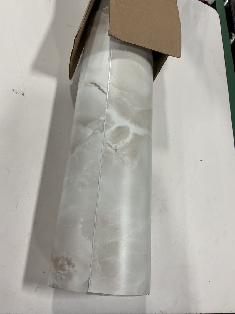 Condition photo showing Good Condition for VEELIKE Cream Onyx Marble Contact Paper for Countertops Peel and Stick Waterproof Marble Countertop Contact Paper 15.7''x118'' Kitchen Countertop Peel and Stick Marble Wallpaper for Wall Counter Table 15.7" x 118"