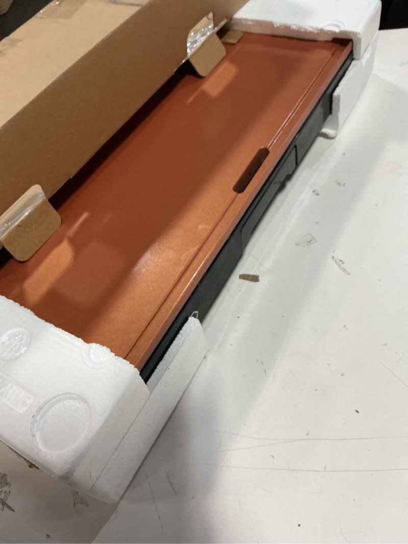 Condition photo showing Good Condition for BELLA XL Electric Ceramic Titanium Griddle, Make 15 Eggs At Once, Healthy-Eco Non-stick Coating, Hassle-Free Clean Up, Large Submersible Cooking Surface, 12" x 22", Copper/Black 12" x 22" Copper