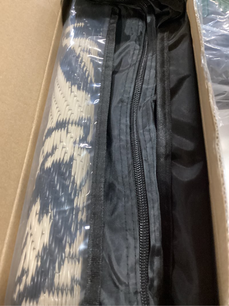 Condition photo showing New/Like New for garvee 5’x8’ waterproof patio outdoor rug, outdoor plastic straw rug for camping, rv mat outside, indoor outdoor carpet for porch, deck, backyard, balcony, picnic, black & brown black & brown-butterfly 5' x 8' (rectangular)