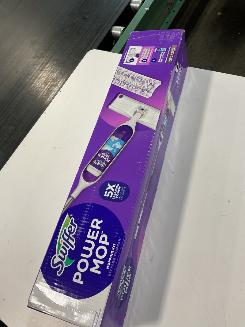 Condition photo showing New/Like New for swiffer powermop multi-surface mop kit for floor cleaning, includes powermop, 2 mopping pad refills, 1 cleaning solution with fresh scent and 2 batteries purple and white