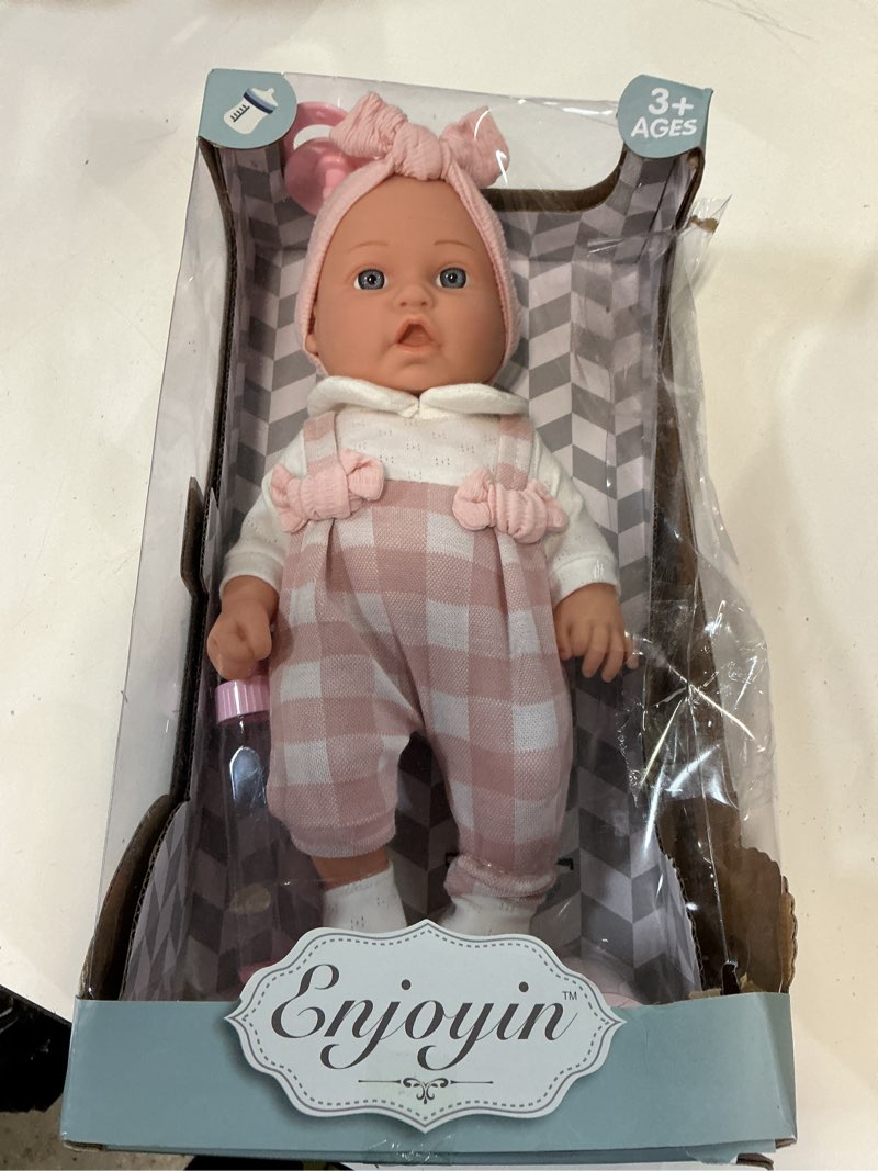 Condition photo showing Good Condition for enjoyin 12'' baby doll in gift box with pink cloths, pacifier, 13''x13'' microfabric blanket, and feeding bottle. gift idea for ages 3+