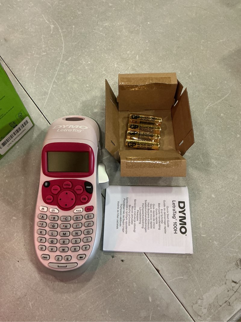 Condition photo showing New/Like New for dymo letratag lt-100h handheld aesthetic label maker, abc keyboard label printer with easy-to-use, 13 character lcd screen, great for home & office organization, pink pink machine + 1 tape