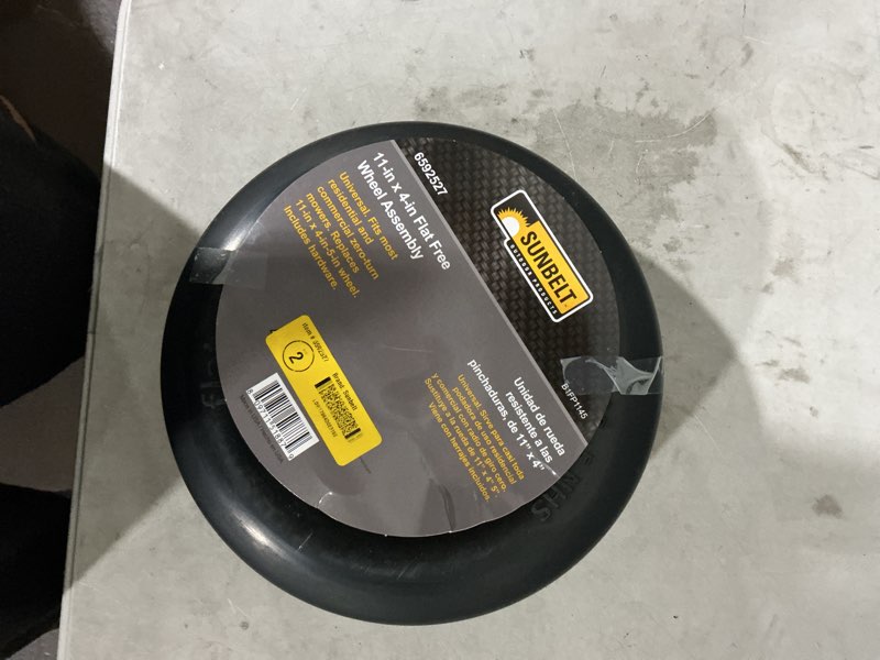 Condition photo showing As Is for sunbelt 11-in x 4-in-5-in smooth front wheel flat-free