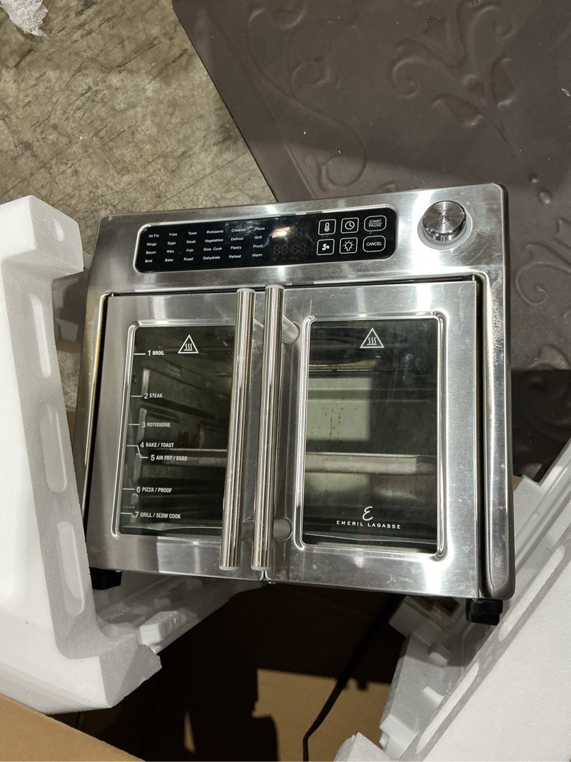 Condition photo showing As Is for emeril lagasse french door air fryer toaster oven combo