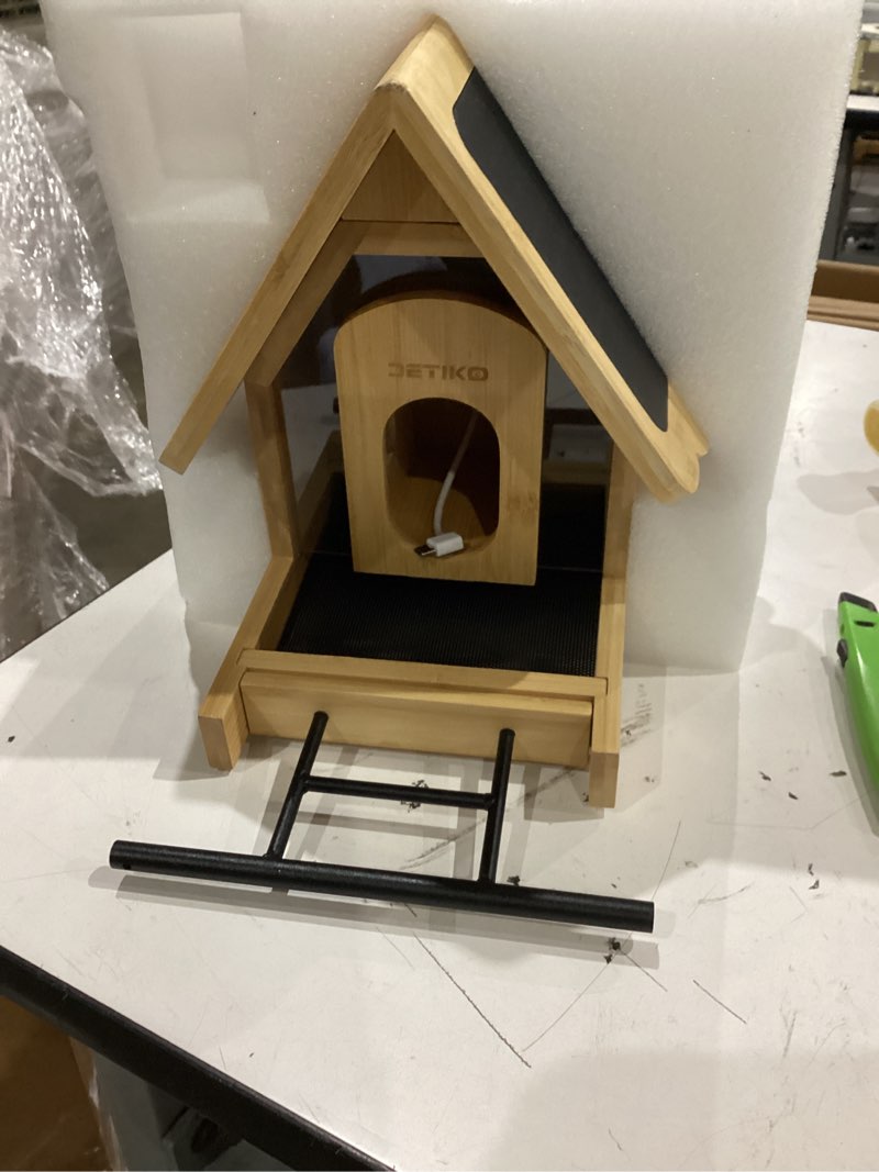 Condition photo showing As Is for smart bird feeder