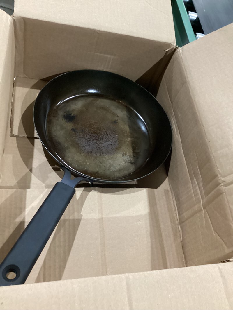 Condition photo showing As Is for OXO Obsidian Pre-Seasoned Carbon Steel, 12" Frying Pan Skillet with Removable Silicone Handle Holder, Induction, Oven Safe, Black