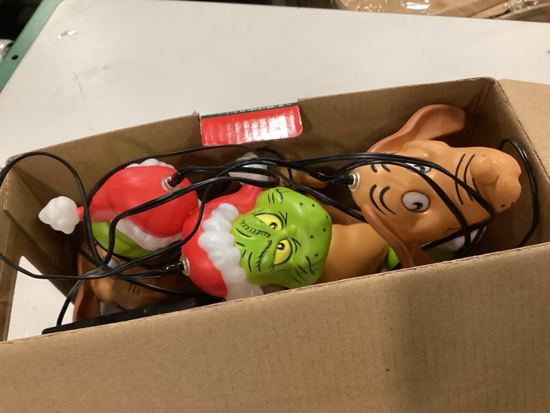 Condition photo showing Good Condition for The Grinch Santa Hat Dr Seuss Emoteglow Projection Musical Light String ( similar 