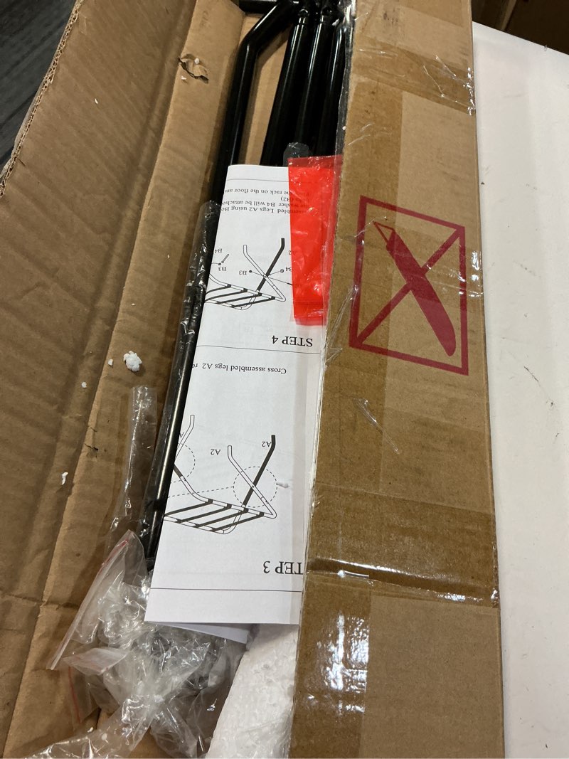 Condition photo showing Good Condition for king's brand furniture-black metal foldable luggage rack stand with nylon belts without shelf - black