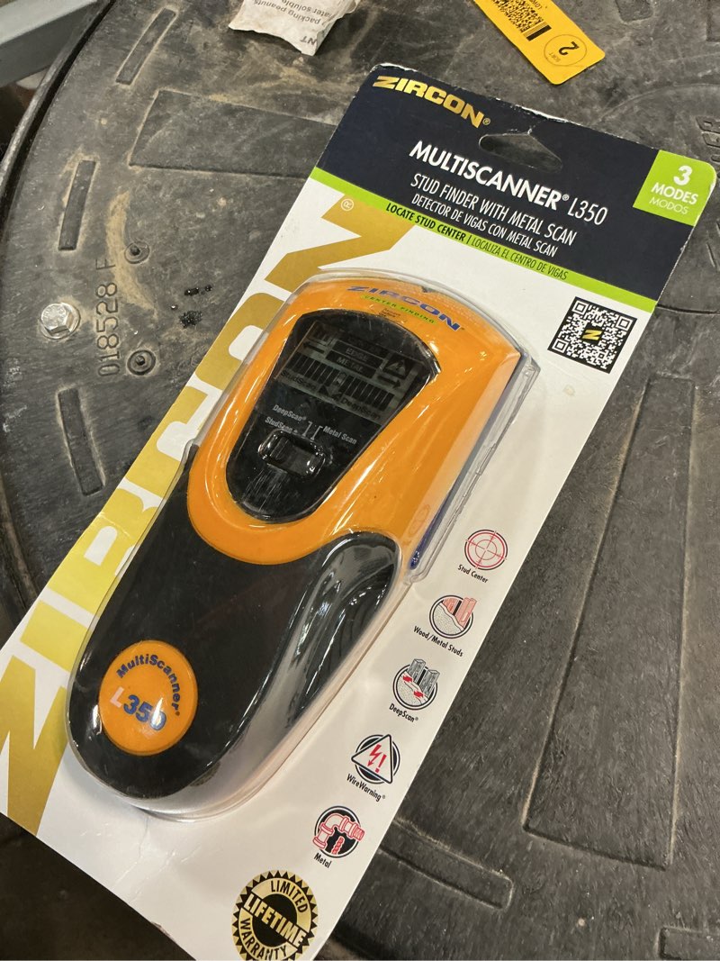 Condition photo showing As Is for zircon 1.5-in scan depth metal and wood stud finder