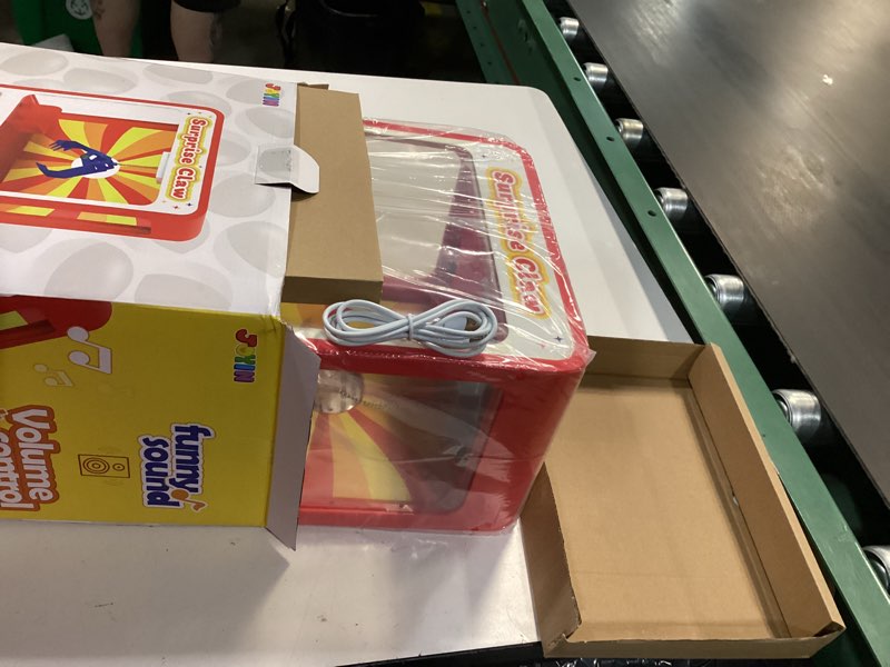 Condition photo showing New/Like New for JOYIN Claw Machine Arcade Toy with LED Light & Adjustable Sound, Rechargable Dispenser Toys Mini Vending Machine for Kids - Perfect Christmas & Birthday Big Gifts for Kids, Ages 3+