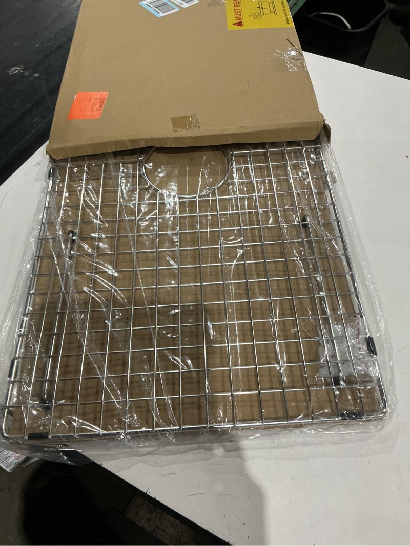 Condition photo showing Good Condition for sink bottom grid 29-1/2" x 15-9/16", centered drain with corner radius 3/8", sink protector for single bowl kitchen sinks 29-1/2" x 15-9/16" centered drain
