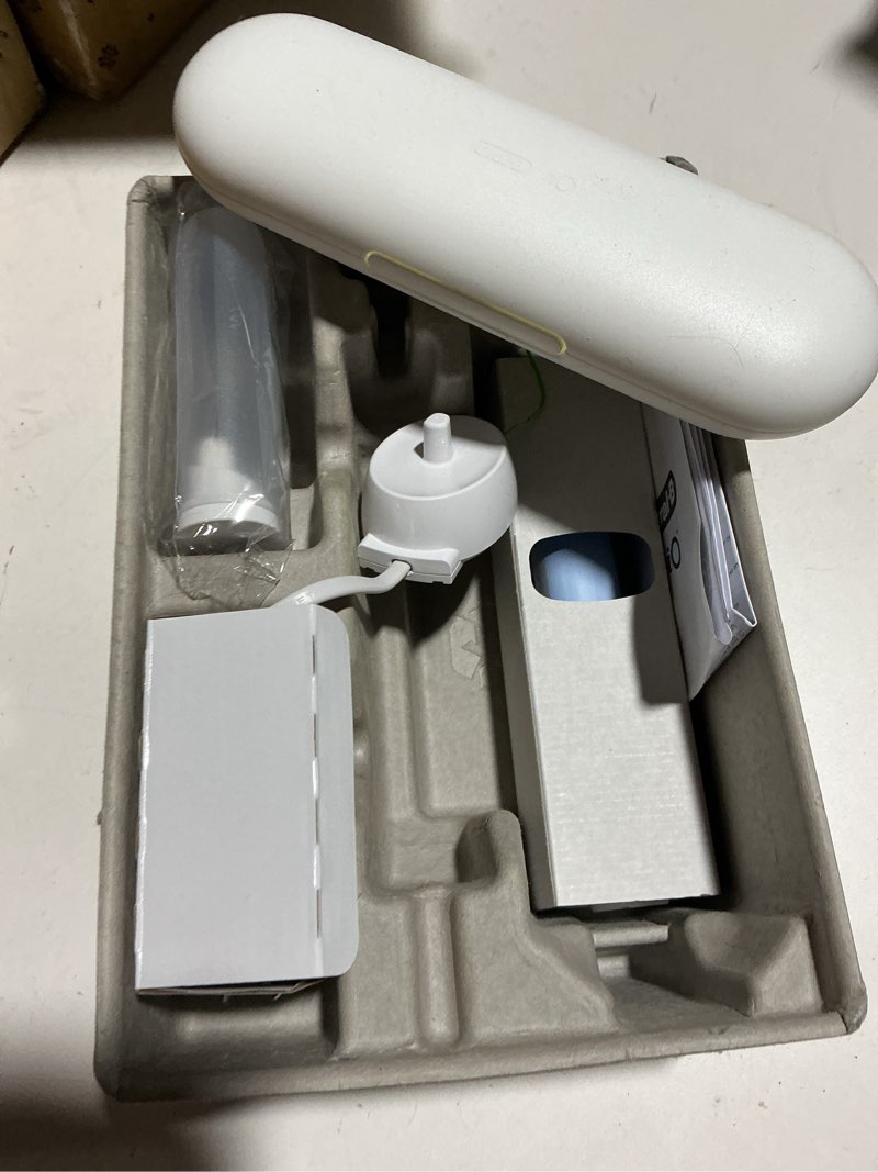 Condition photo showing As Is for oral-b io series 3 limited rechargeable electric powered toothbrush, blue with 2 brush heads and travel case - visible pressure sensor to protect gums - 3 modes - 2 minute timer