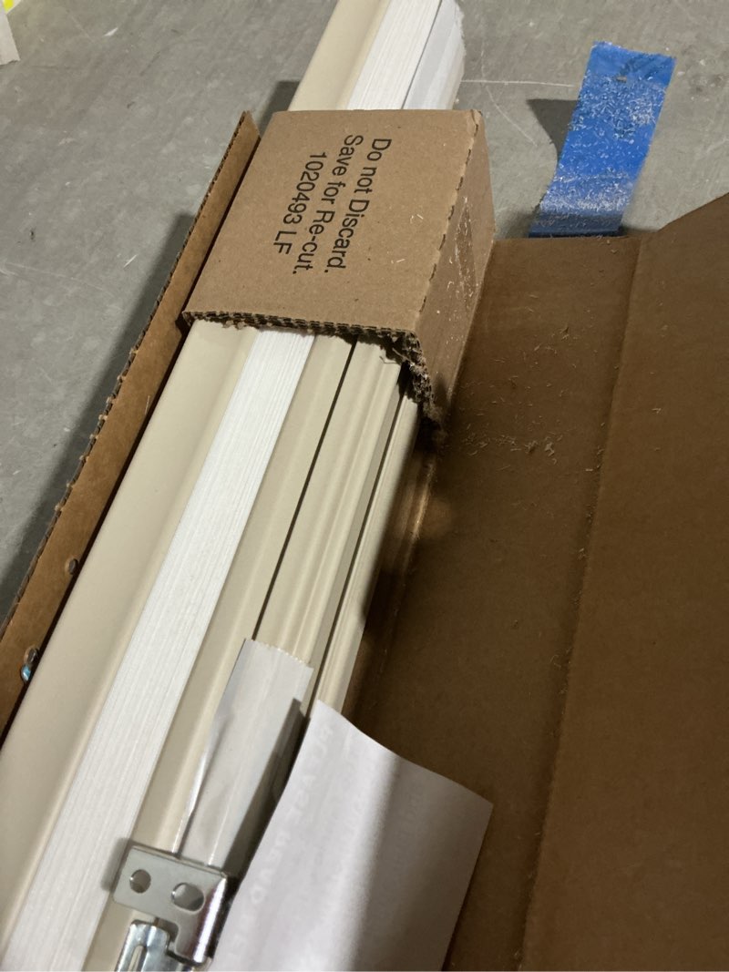 Condition photo showing As Is for levolor 36-in x 72-in sand light filtering cordless cellular shade