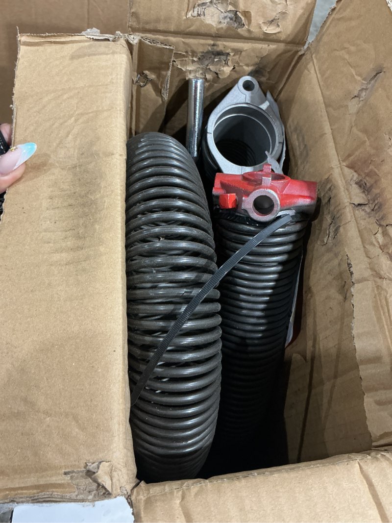 Condition photo showing As Is for garage door torsion springs 2'' (pair) with non-slip winding bars, coated torsion springs with a minimum of 18,000 cycles (0.218x2''x25'')