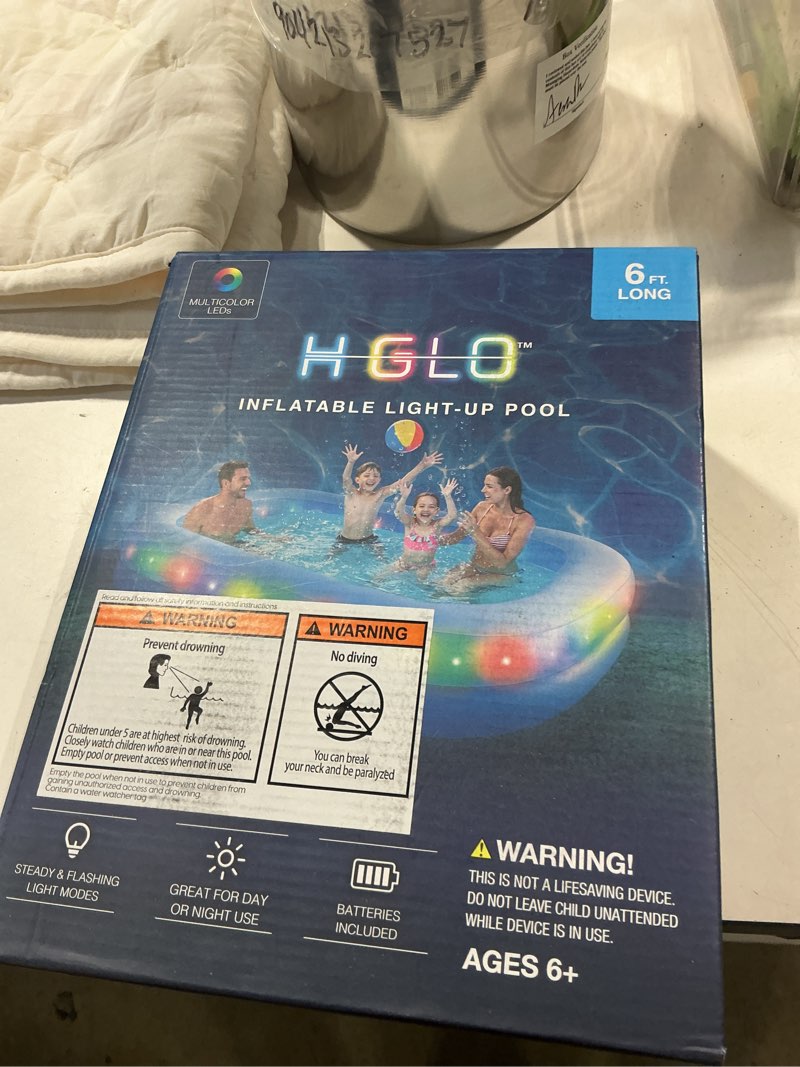 Condition photo showing Good Condition for merkury innovations hglo 6 ft inflatable led swimming pool, multi-colored light