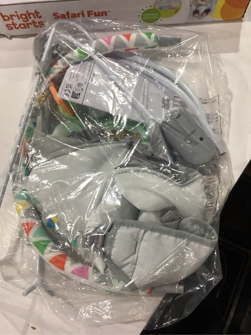 Condition photo showing New/Like New for bright starts baby bouncer soothing vibrations infant seat - removable -toy bar, nonslip feet, 0-6 months up to 20 lbs (safari fun)