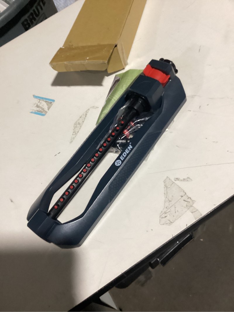 Condition photo showing As Is for Eden 94105 Lawn & Garden Essential Oscillating Water Sprinkler for Yard with Width and Flow Control